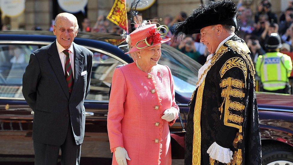 Queen Elizabeth II, accompanied by the Prince Phillip, Duke of Edinburgh, are greeted by the Lord Mayor of Birmingham Councillor John Lines as they arrive for her Diamond Jubilee visit to the City on July 12, 2012 in Birmingham,