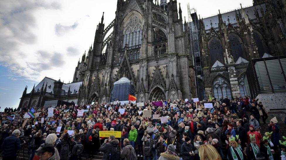 Protesters outside Cologne cathedral (9 January)