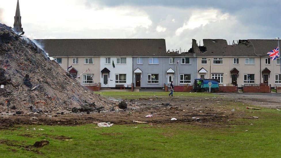 Fire-damaged houses at Hopewell Square in Belfast's Shankill area