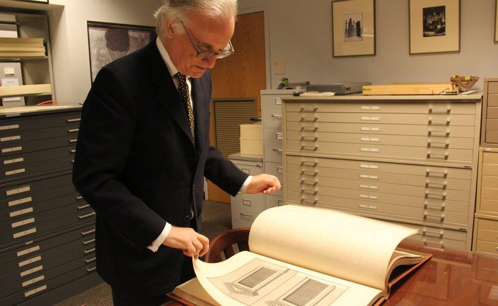 Julian Raby looks at a copy of The Ruins of Palmyra in the Freer's archive