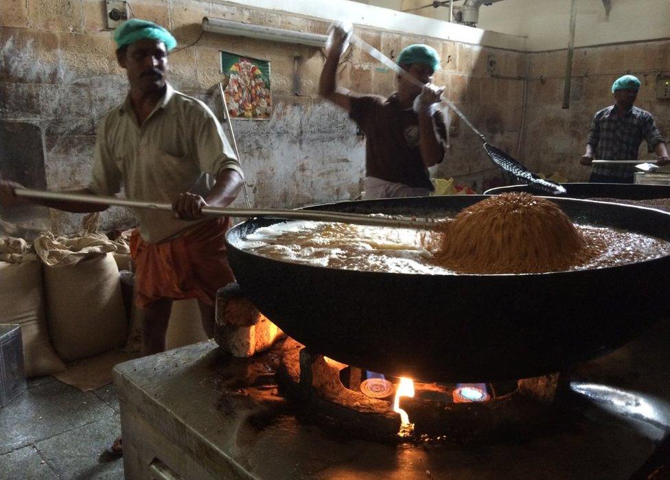 The temple kitchen feeds nearly 120,000 pilgrims every day