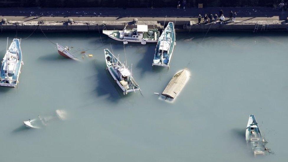 Capsized boats in Muroto, Kochi prefecture, Japan. Photo: 16 January 2022