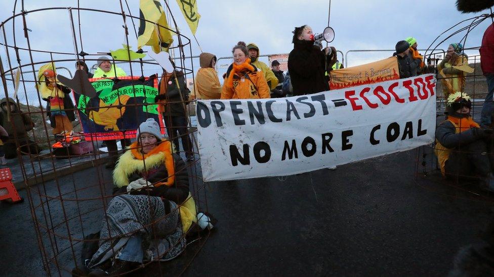 Protesters outside the site