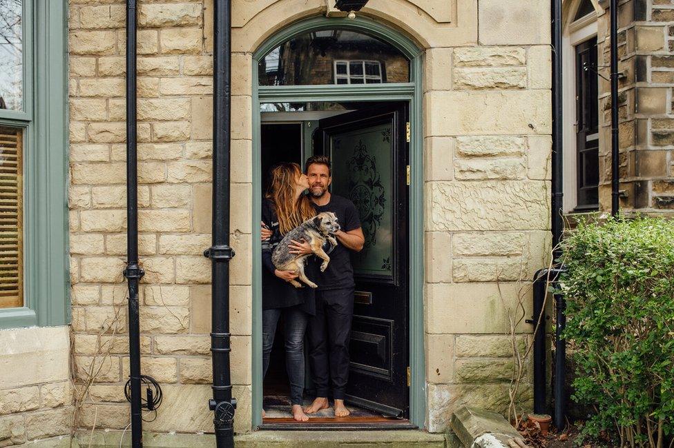 Doorstep portrait of Sally, Tim and Mini in Nether Edge