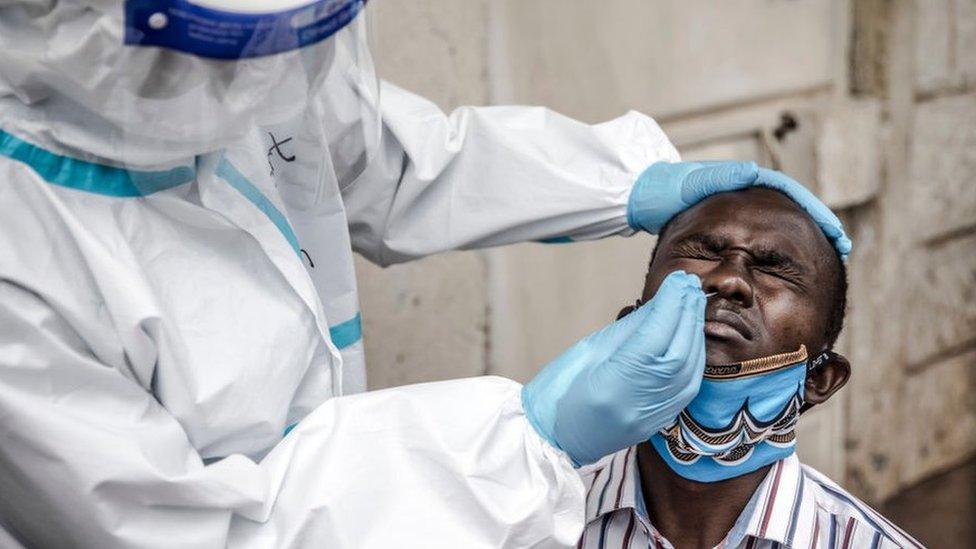 A man gets a nasal swab in Kenya