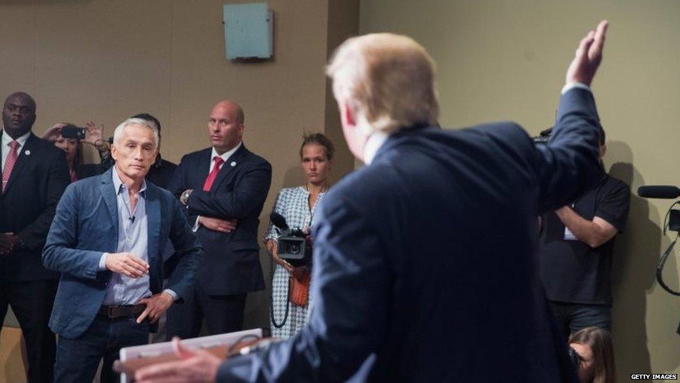 Republican presidential candidate Donald Trump spars with Univision reporter Jorge Ramos during a news conference hosted by Mr Trump news on Tuesday (25 August 2015)