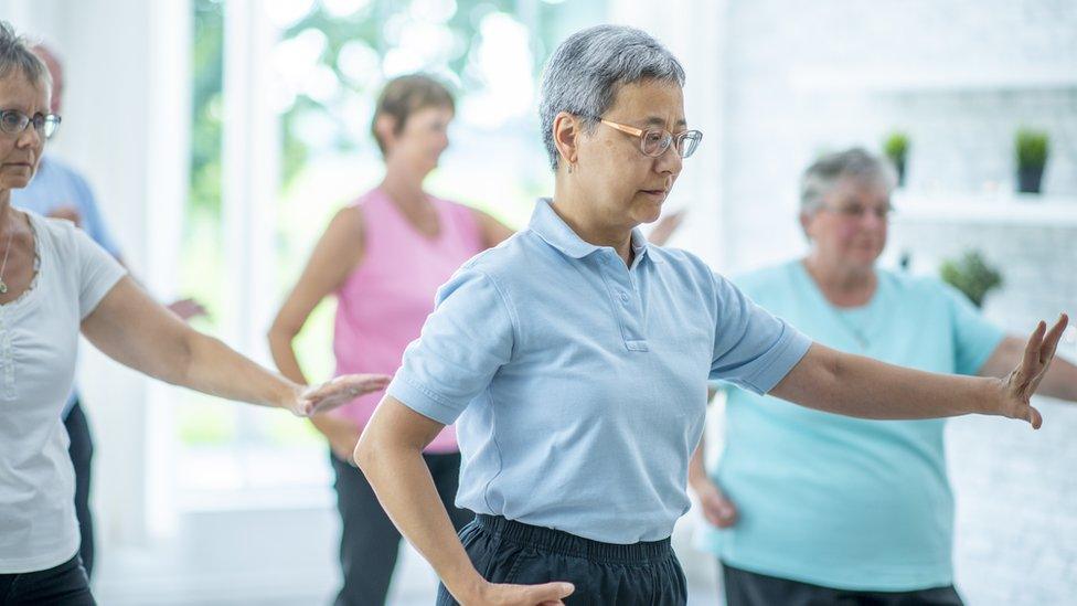 Women doing tai chi