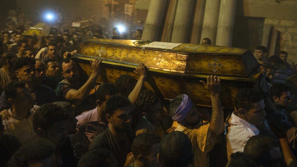 Mourners during the funeral of victims killed in an attack at the Monastery of St Samuel the Confessor, in Minya Province, central Egypt, 26 May 2017.