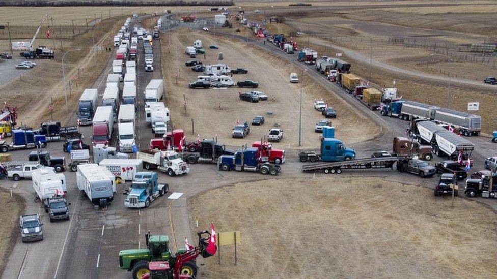 A lorry convoy blocks the US-Canada border near Coutts, Alberta