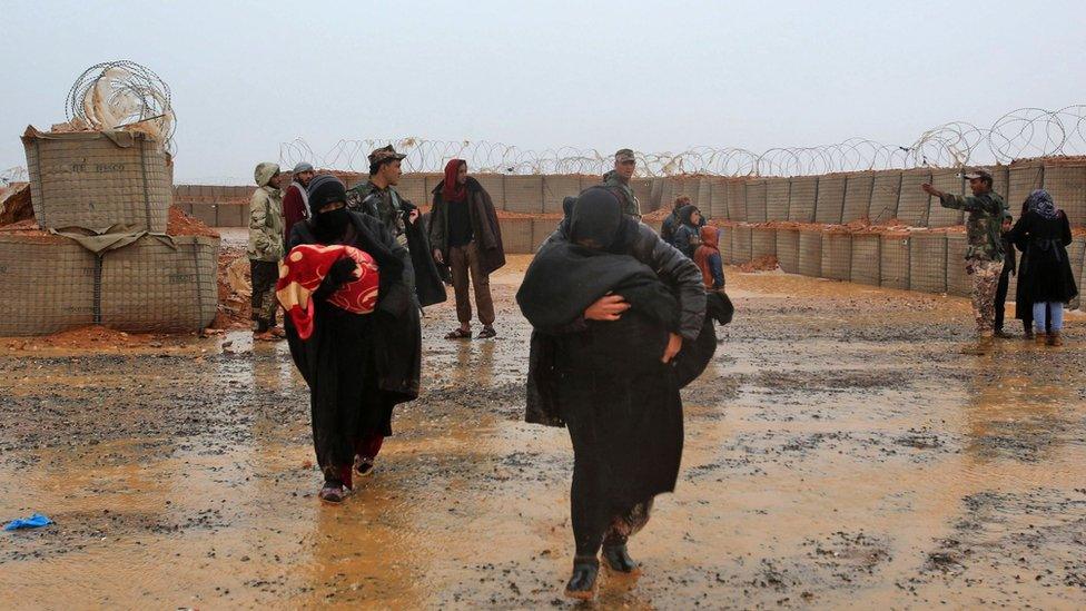 Syrian refugee patients from the makeshift Rukban camp cross over to visit a UN-operated medical clinic immediately on the Jordanian-side for checkups, 1 March 2017