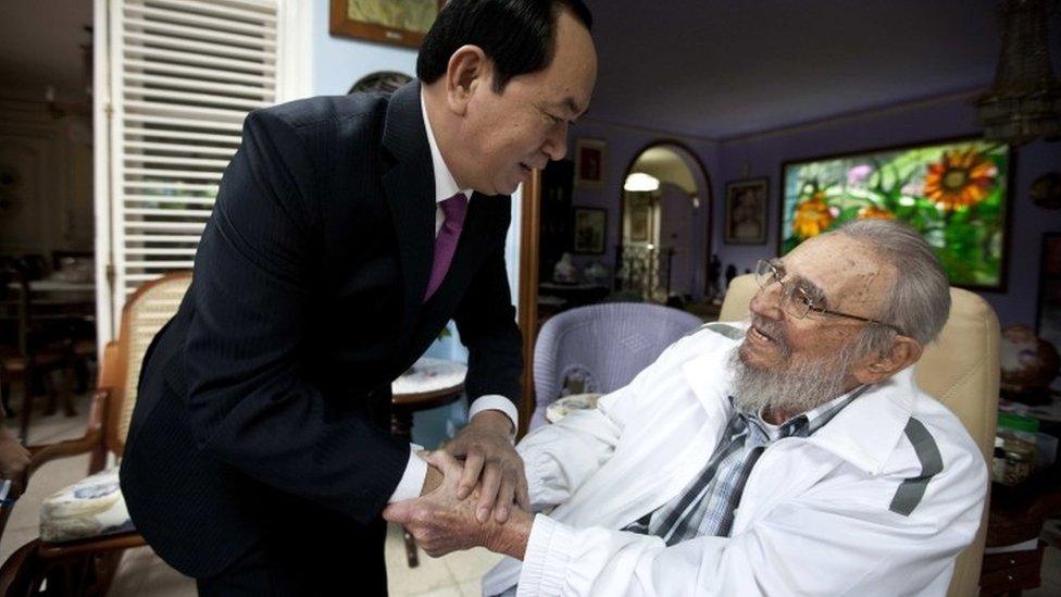 Cuba"s former leader Fidel Castro, right, shakes hands with Vietnamese President Tran Dai Quang, left, in Havana, Cuba, Tuesday, Nov. 15, 2016.