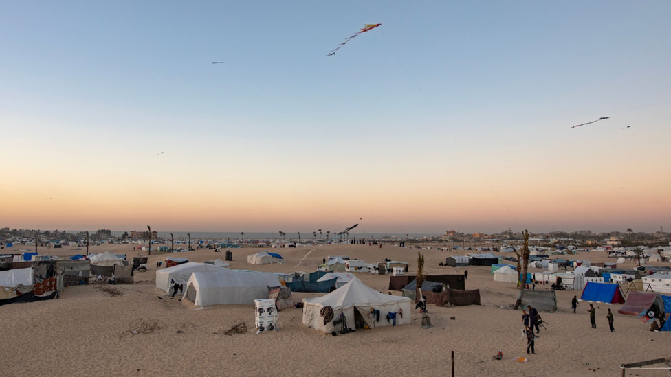 Displaced Palestinians at Rafah refugee camp, near the border with Egypt