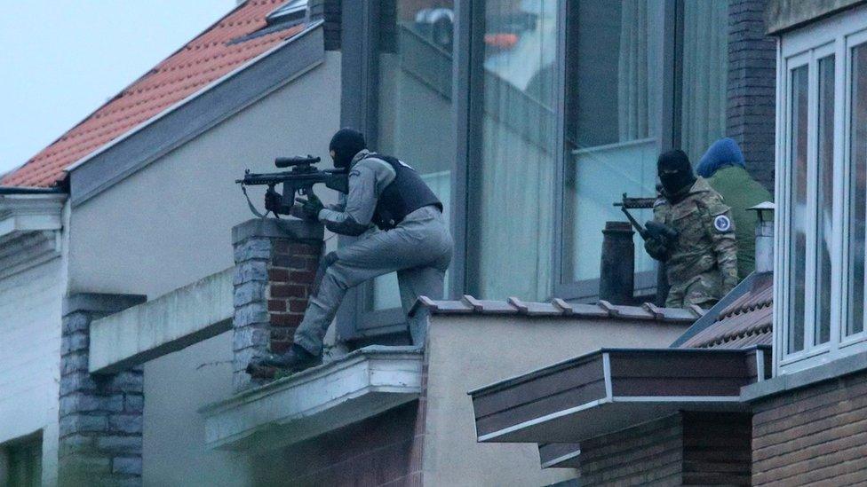 Security forces at the scene of a shoot-out in Brussels