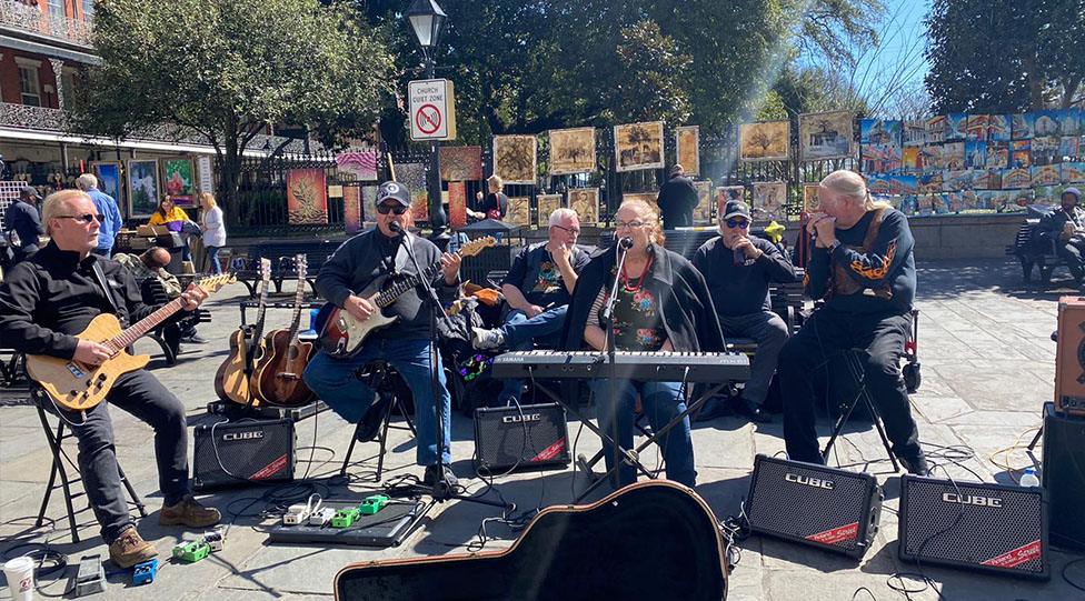 Pastor Spradlin (middle) and Jean on the keyboard at Mardi Gras 2020