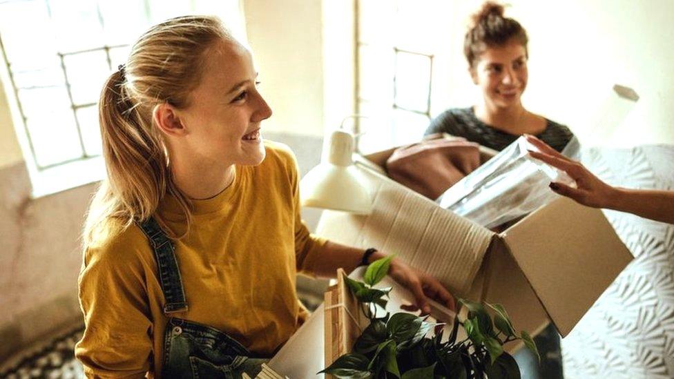 Women moving into student accommodation