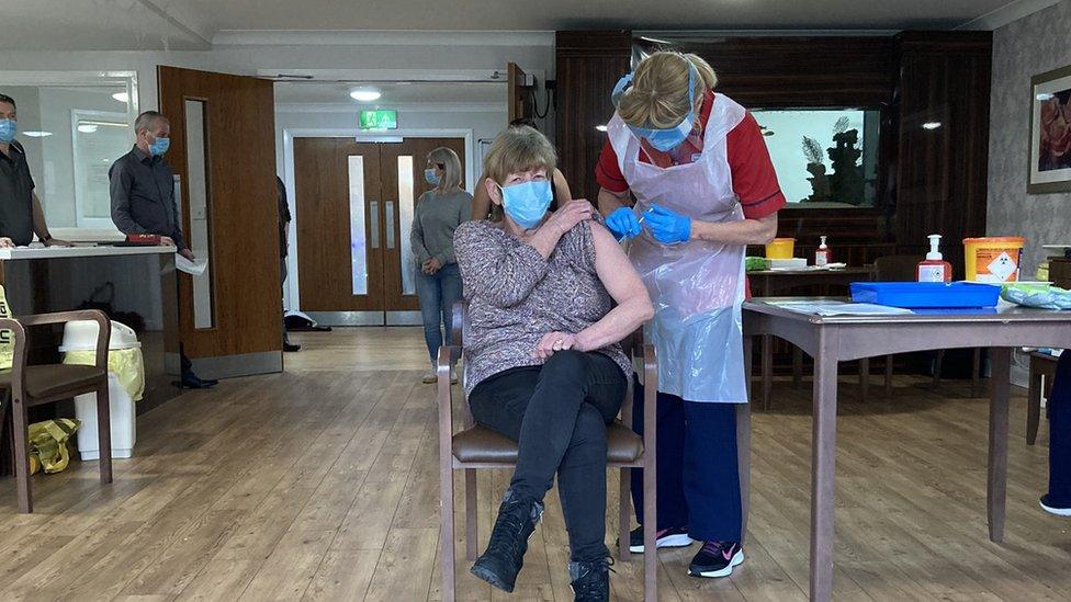 Patient receiving coronavirus vaccine