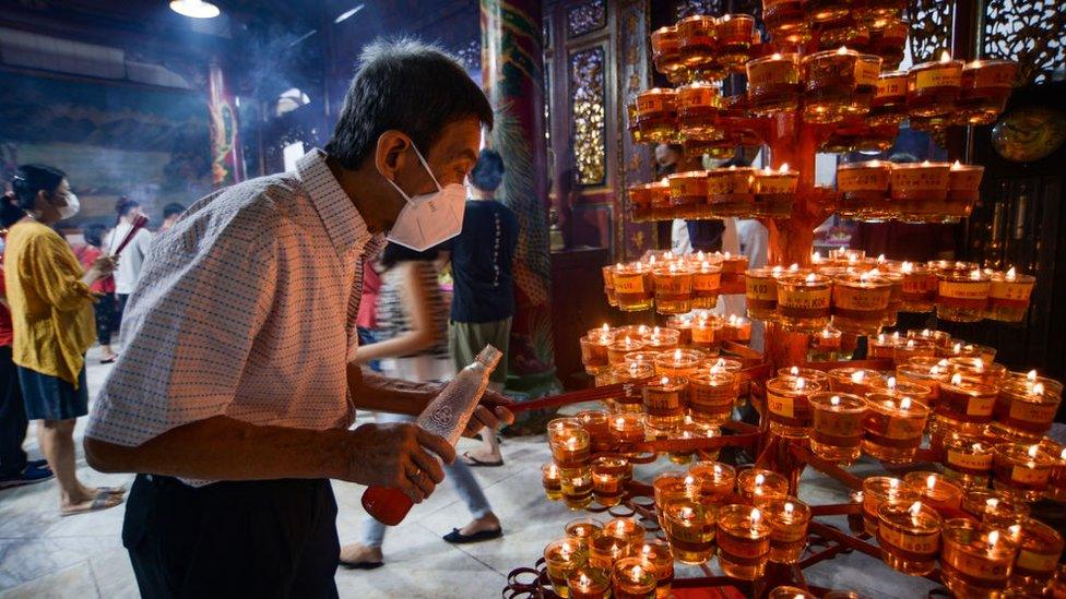 A man prays in Palembang, Indonesia