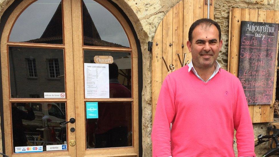 Christophe Constantin in front of his Veloc café Perigueux