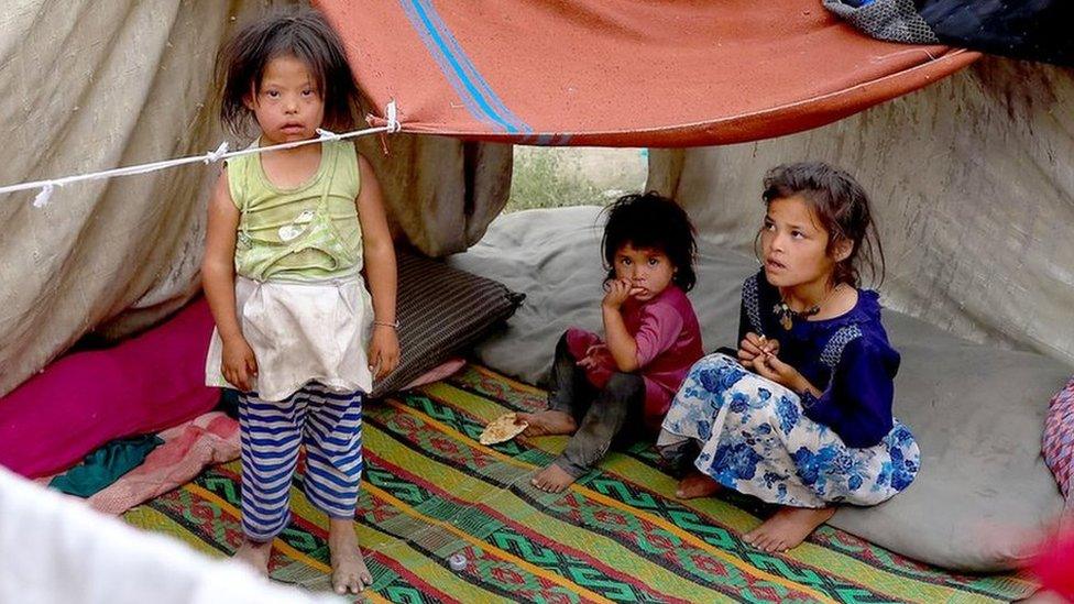 Children from displaced families taking shelter in a park in Kabul