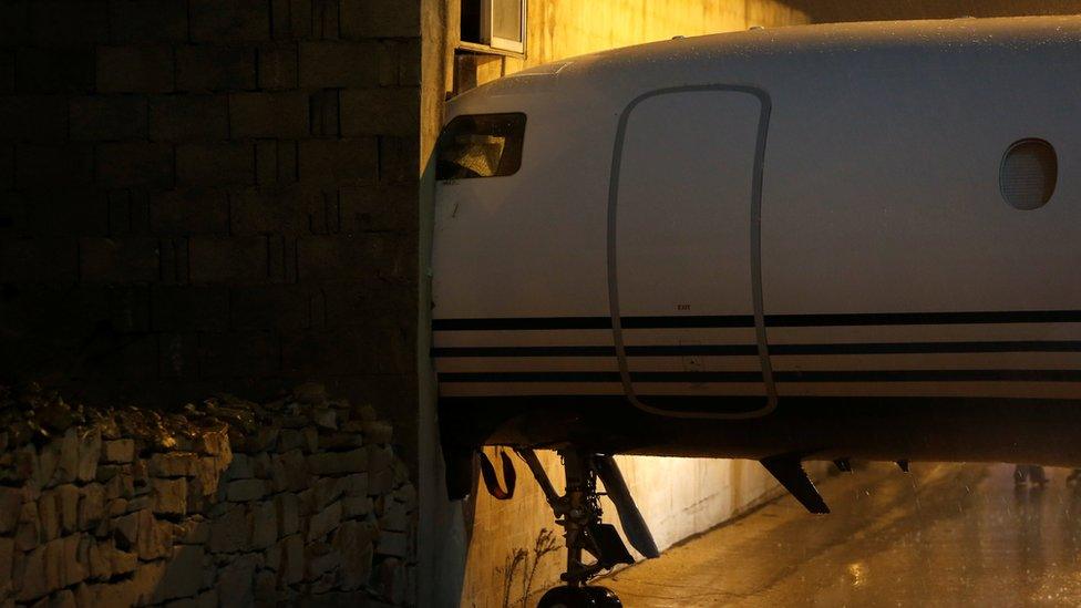 The nose of the plane can be seen hitting the side of an airport building at Malta International airport on 27 December 2017.