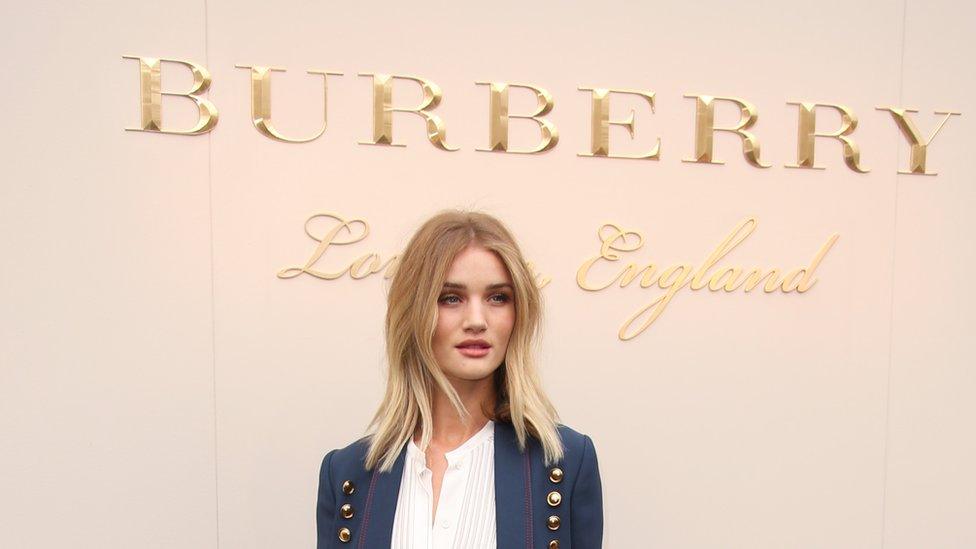 Model Rosie Huntington-Whiteley poses for photographers