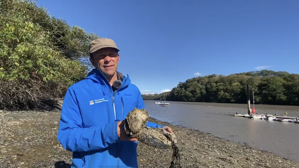 Matt holding a pacific oyster