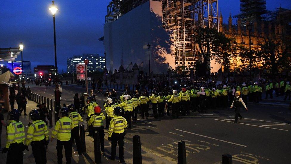 Police scuffle with protesters during a Black Lives Matter protest in central London