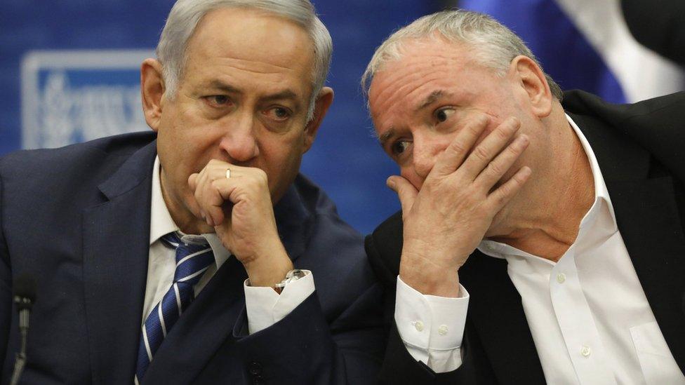 Israeli Prime Minister Benjamin Netanyahu (L) and lawmaker David Amsalem (R) attend a meeting of the Likud party at the Knesset, in Jerusalem, Israel (25 December 2017)