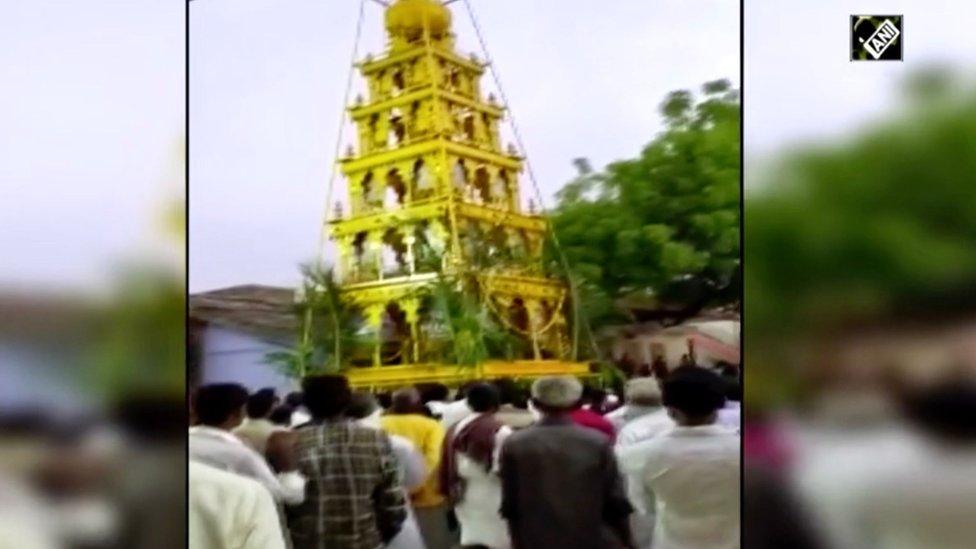 People participating in the chariot-pulling festival