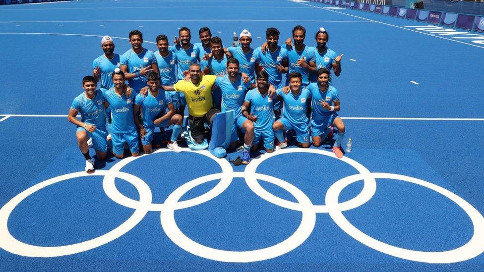 Team India poses for a picture after winning the Men's Bronze medal match between Germany and India on day thirteen of the Tokyo 2020 Olympic Games