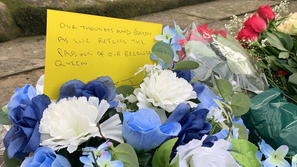 Flowers have been placed in the ruins of Coventry Cathedral