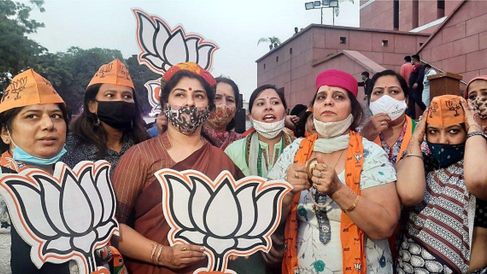 BJP Supporter and activist celebrating BJP Leading win Bihar assembly election at Delhi BJP HQ on November 10, 2020 in New Delhi, India.