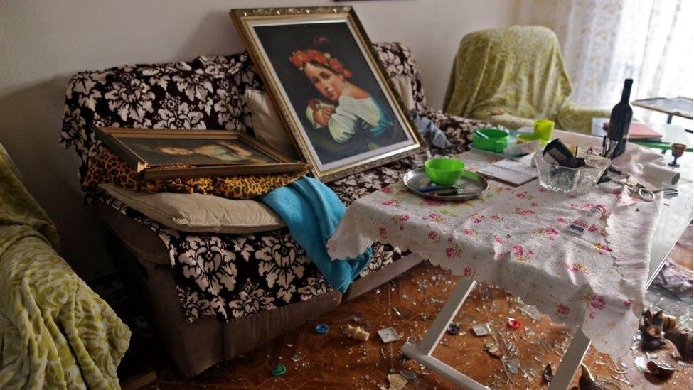 A photo taken on May 17, 2021 shows a damaged apartment in a residential neighbourhood in the southern Israeli city of Ashdod