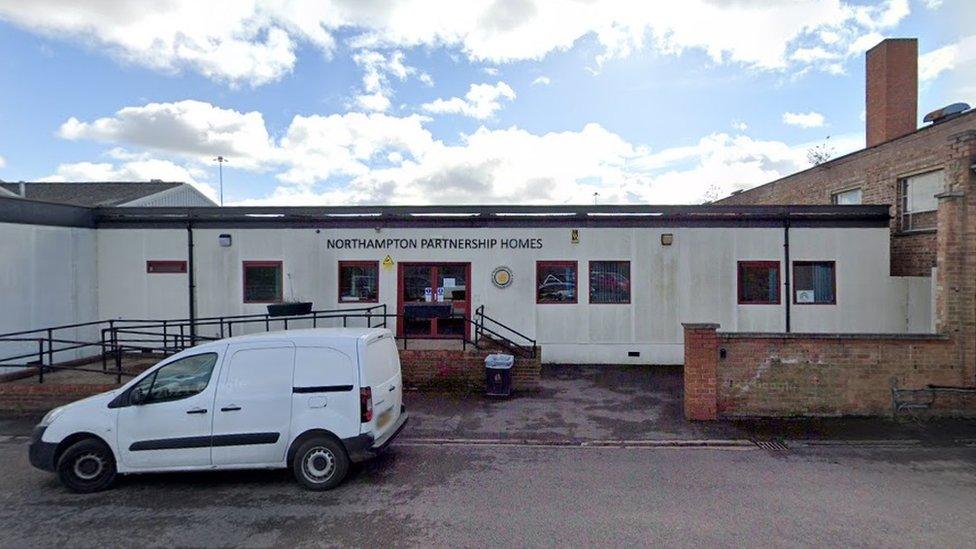 Mobile office buildings with Northamptonshire Partnership Homes sign above door