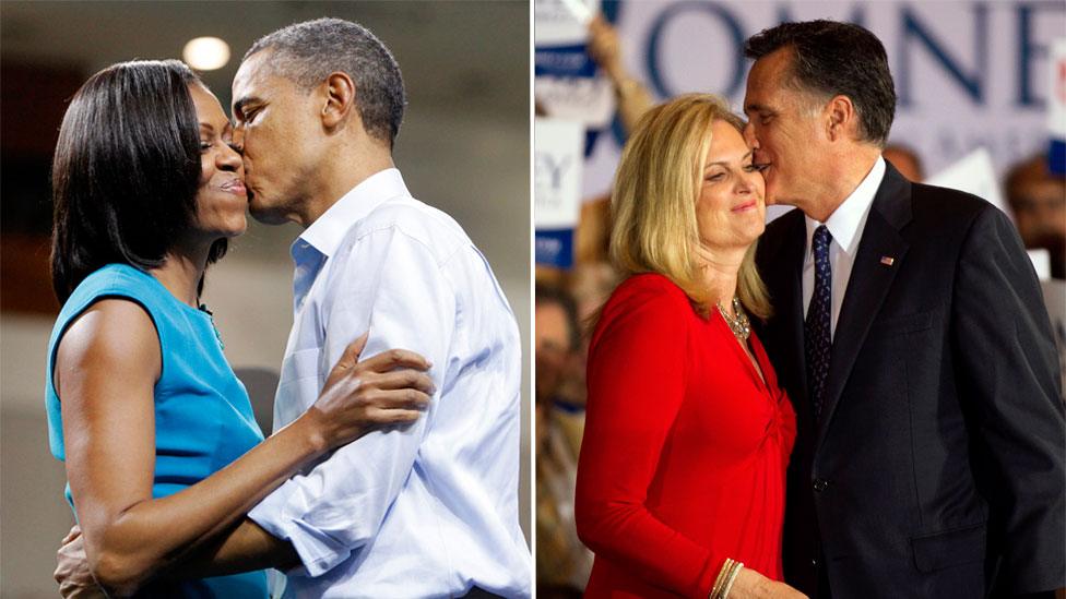 The candidates kiss their wives on the campaign trail