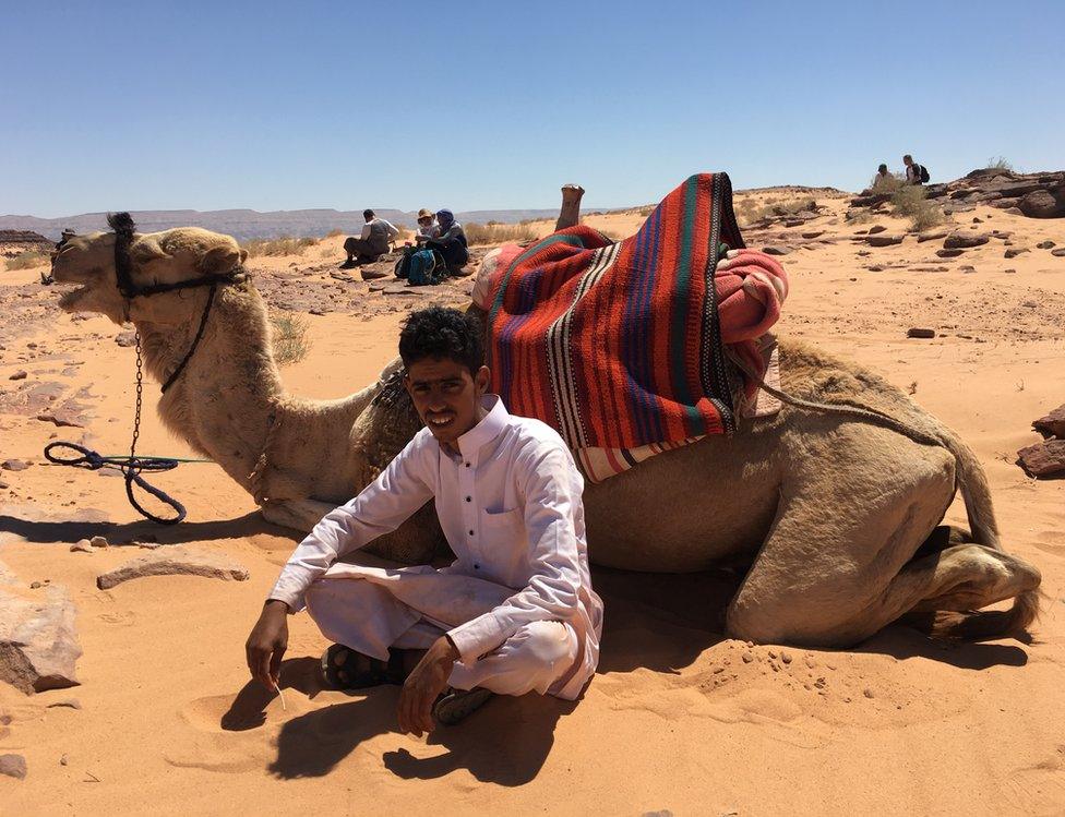 Boy with camel