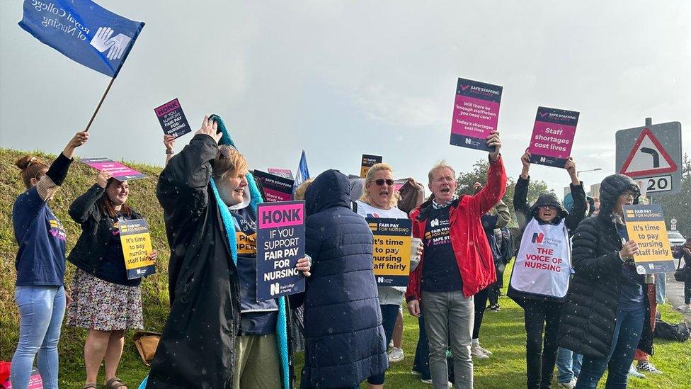 Nurses with placards