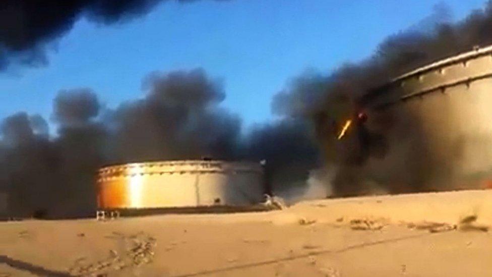 Image grab of oil storage tanks on fire in Sidra. 5 Jan 2016