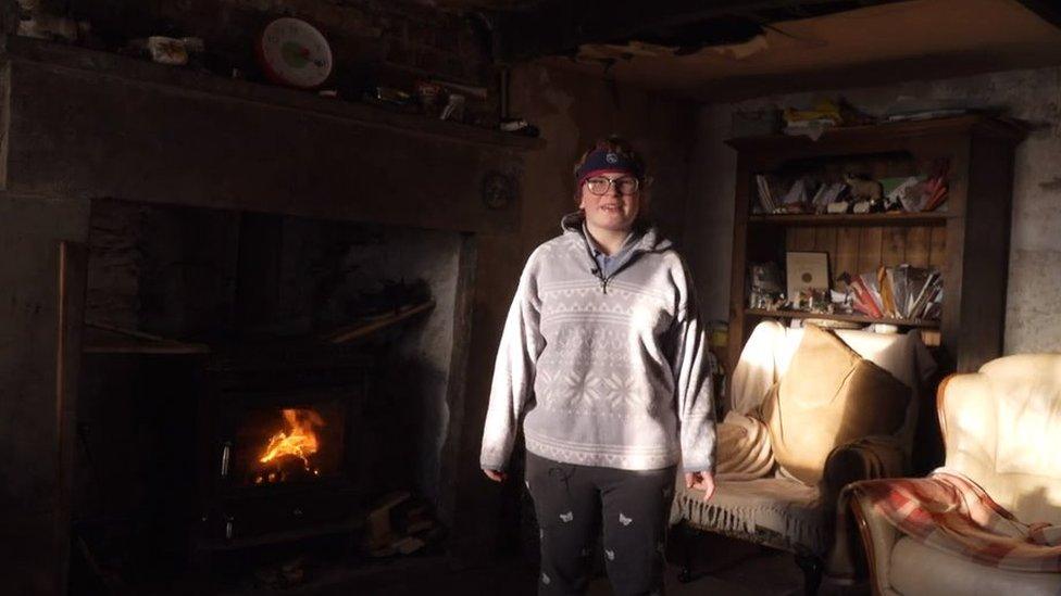 Hannah in her sitting room