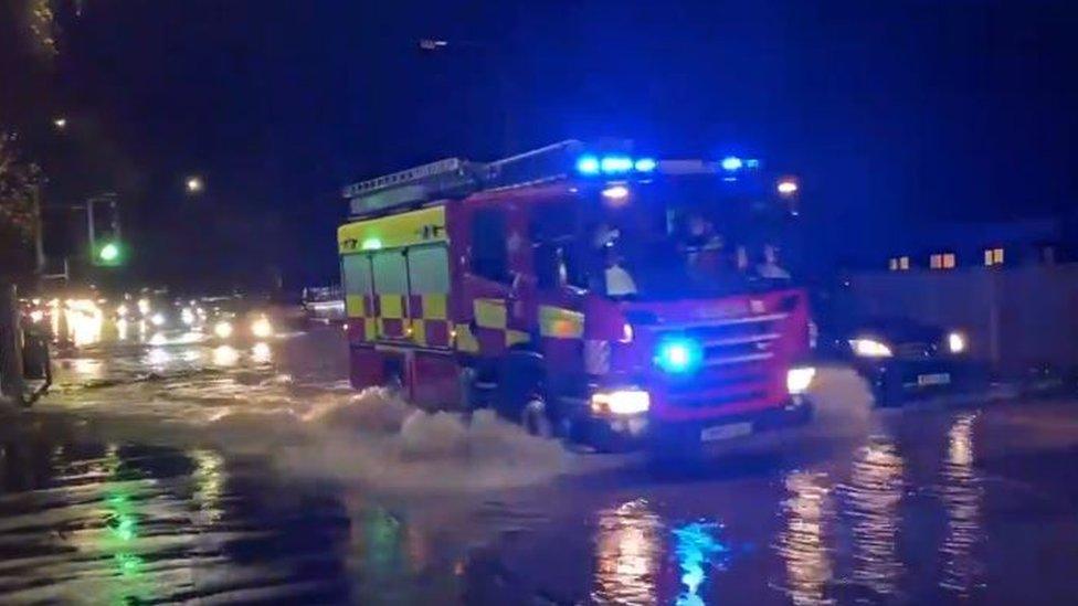 fire engine driving through water