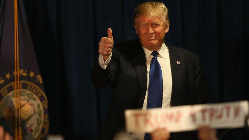 Republican presidential candidate Donald Trump walks on stage to speak after Primary day at his election night watch party at the Executive Court Banquet facility on February 9, 2016 in Manchester, New Hampshire. Trump was projected the Republican winner shortly after the polls closed