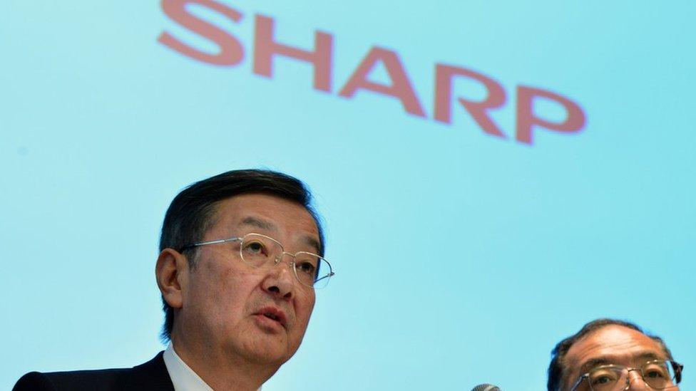 Kozo Takahashi, left, is president of Japan's electronics giant Sharp Corporation