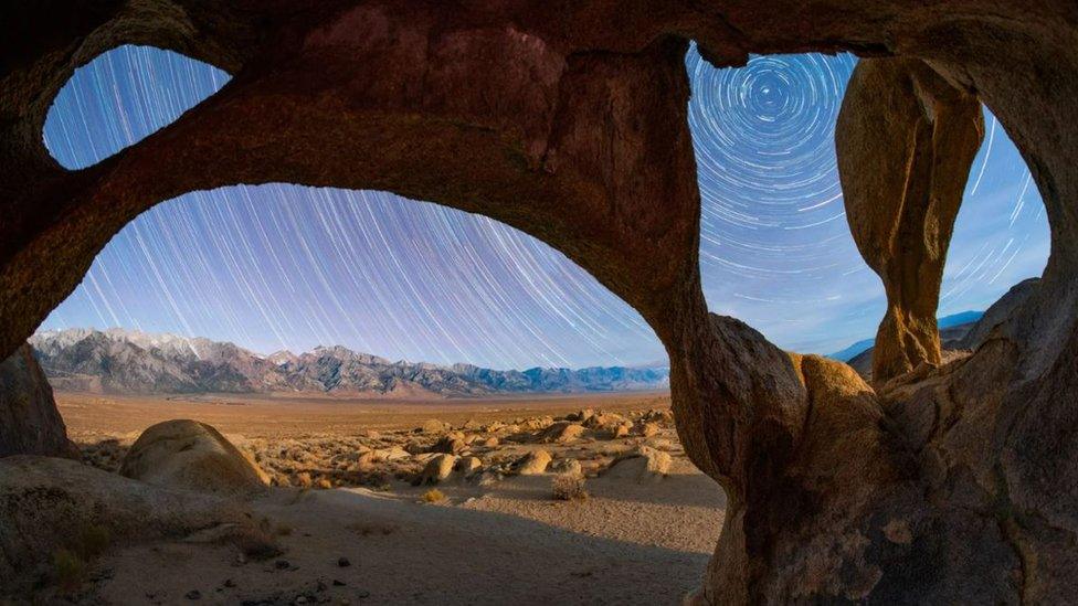 Viewed from under a quadruple arch, the stars circle around Polaris (Picture: Sean Goebel)