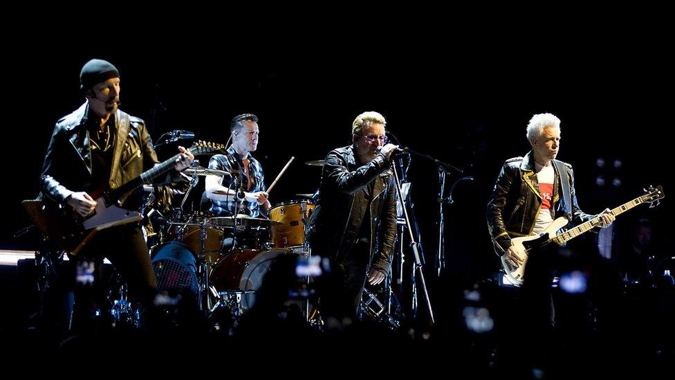 U2 performing on stage