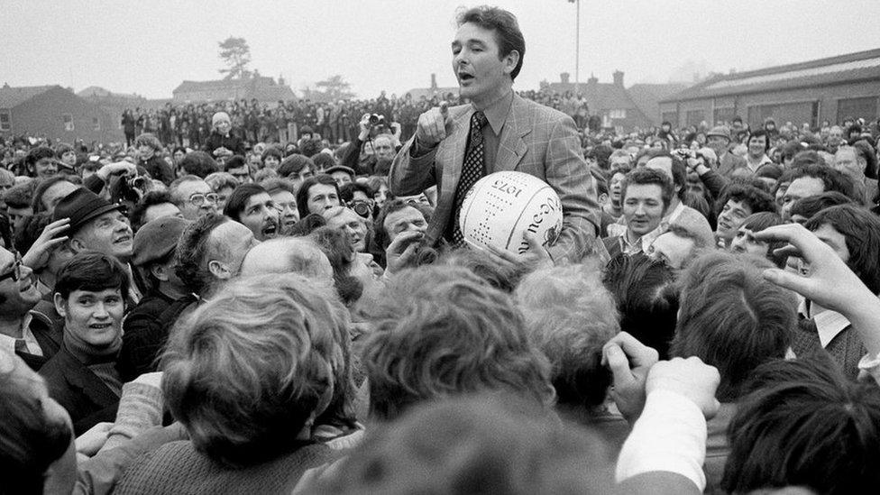 Nottingham Forest manager Brian Clough addresses the crowd before starting the game in 1975