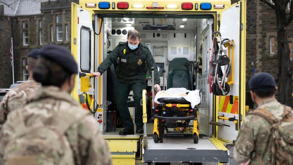 Soldiers at work on an ambulance