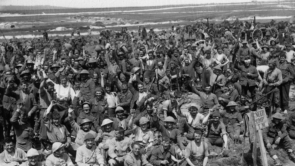 Soldiers resting after a battle in World War One