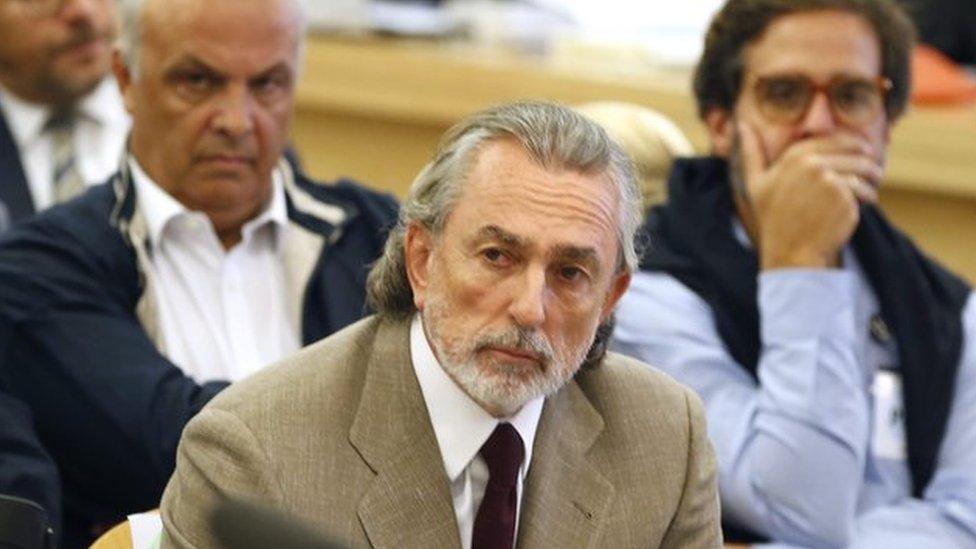 Francisco Correa (R), alleged ringleader of the "Gurtel" corruption case, attends the first day of the trial in the Gurtel political corruption scandal at the National Court of San Fernando de Henares, in Madrid, Spain, 4 October