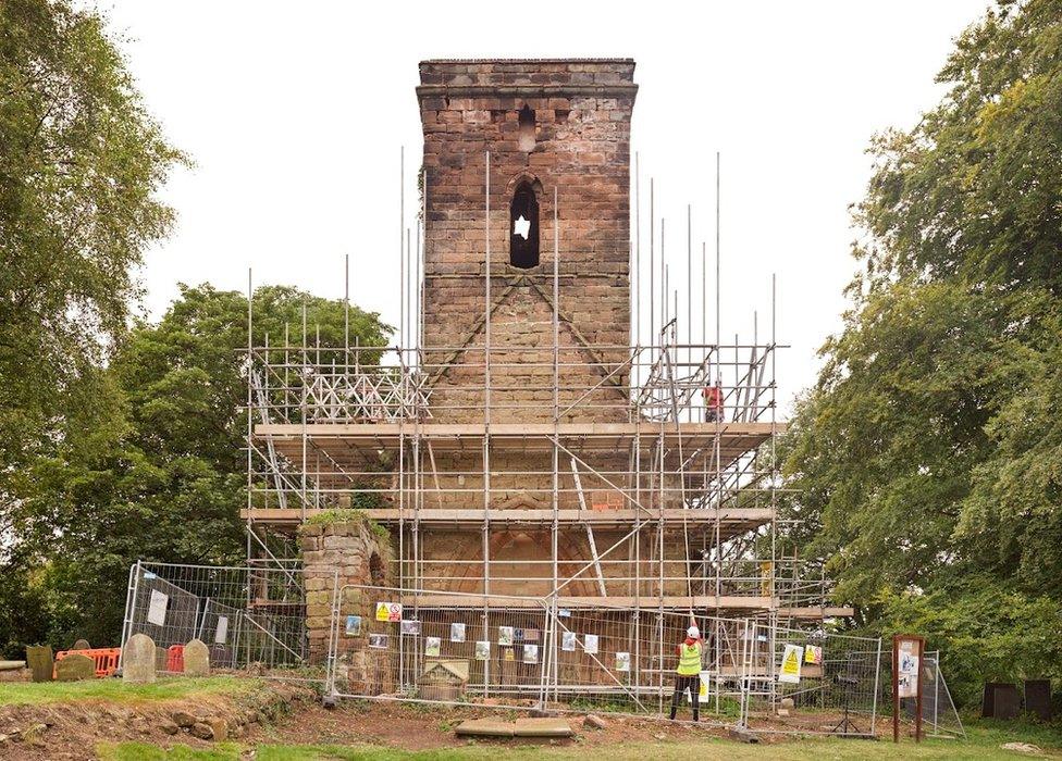 Scaffolding going up prior to repair