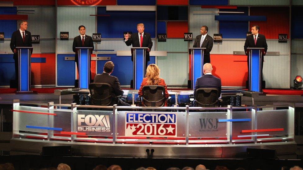 Presidential candidate Donald Trump (3th L) speaks while Jeb Bush, Sen. Marco Rubio (R-FL), Ben Carson, and Ted Cruz (R-TX) take part in the Republican Presidential Debate sponsored by Fox Business and the Wall Street Journal at the Milwaukee Theatre 10 November 2015 in Milwaukee, Wisconsin.